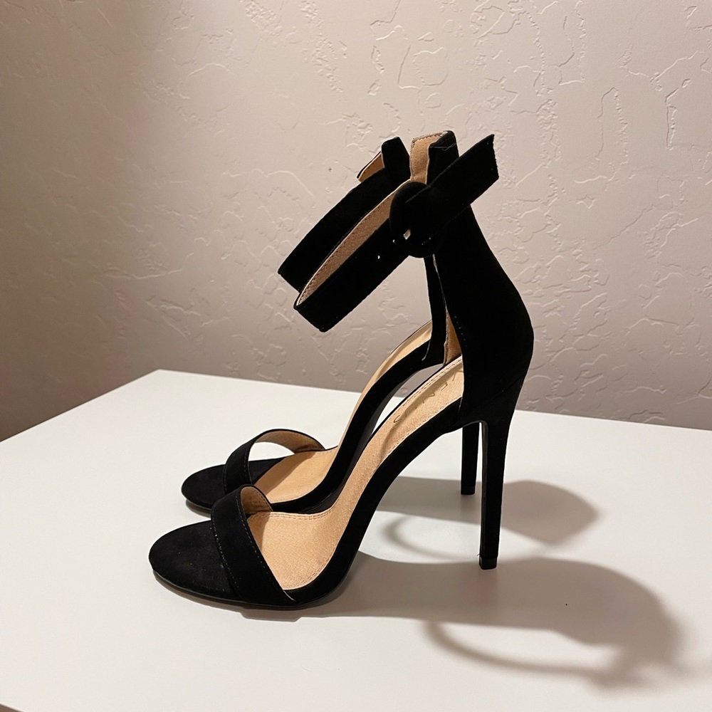 Sexy ankle strap high heels brand new only tried them on.